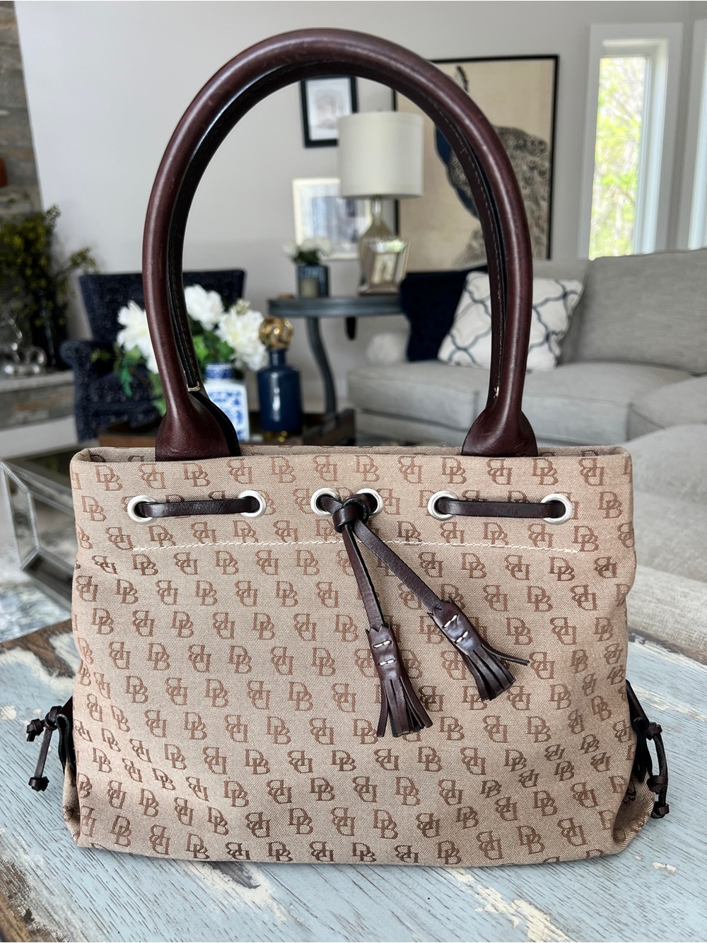 Dooney & Bourke Tan Monogram Drawstring Tote with Dark Brown Handles